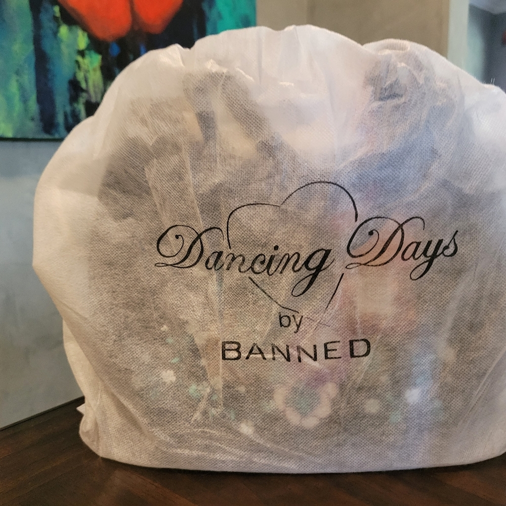 Dancing Days by Banned floral peacock bag